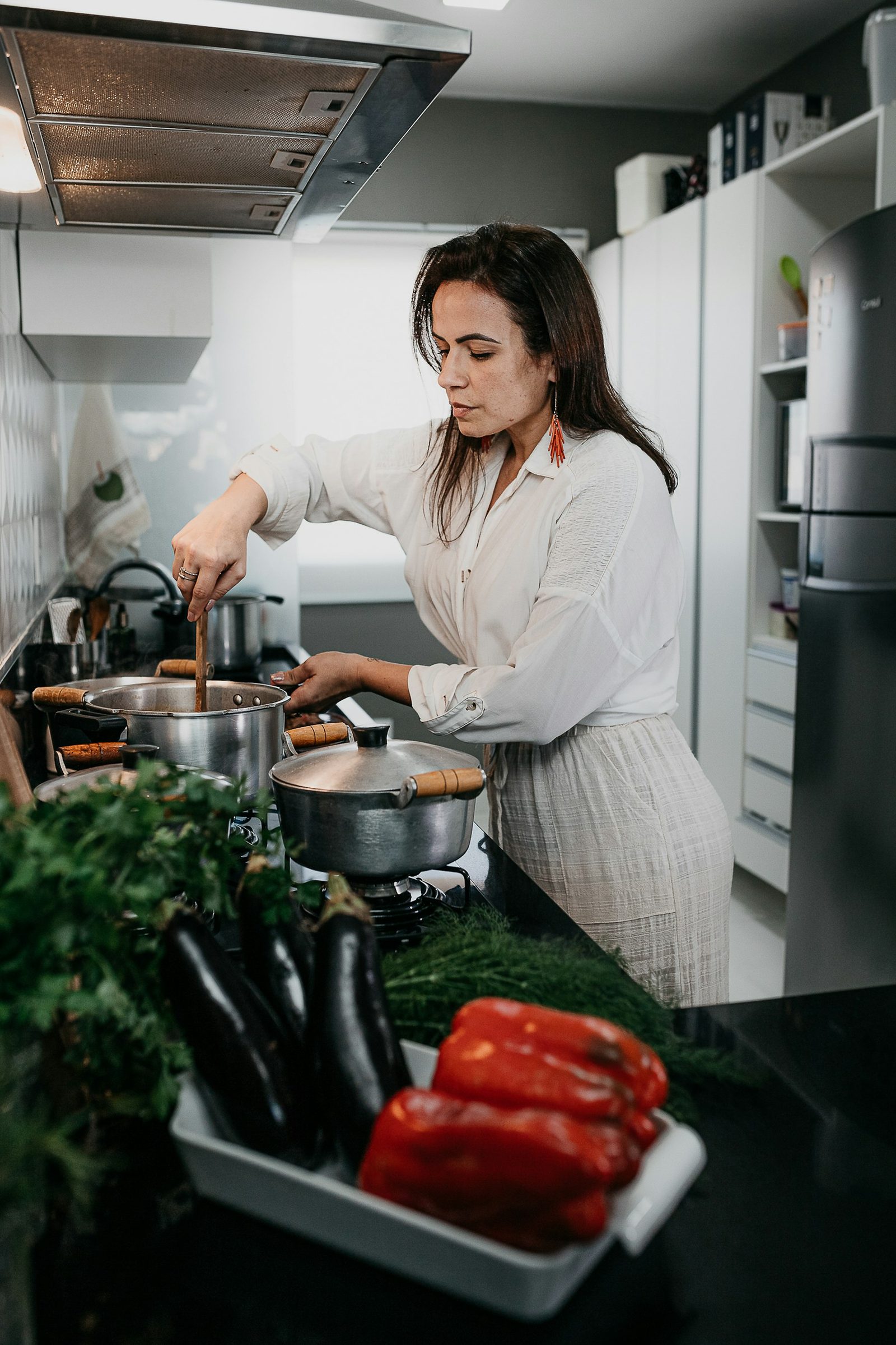 Fresh greens being prepared on a kitchen worktop